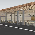 Modern Museum Building With Wooden Roof And Large Glass Windows Outdoor Seating