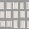Collection of Different Style White Cabinet Doors Arranged on Gray Wall