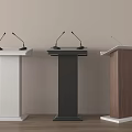 White Black and Brown Podiums with Microphones for Public Speaking Events