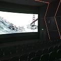 Spacious Modern Cinema Interior With Rows Of Comfortable Seats And Large Screen Soft Lighting