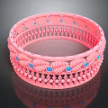 Pink Ornate Bracelet With Blue Gemstones And Intricate Beaded Design Details