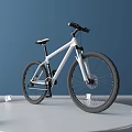 Minimalist Mountain Bicycle With White Frame And Black Wheels In Indoor Studio