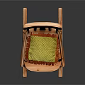 Wooden Rocking Chair With Decorative Backrest Green Cushion And Red Trim Armrests