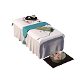 Comfortable Massage Bed With White Sheet Blue Ribbon Black Tray And Pink Petals