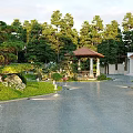 Traditional Garden Landscape Design With Pavilion Lush Green Plants Lawn And Stone Pathway