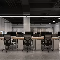 Modern Open Public Office Space with Industrial Gray Tones Long Tables Black Chairs and Computers
