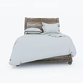 Cozy Rustic Wooden Double Bed With White Sheets Pillows And Blanket