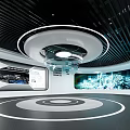 Modern Exhibition Hall with Circular Floor Pattern and Curved Digital Display Walls