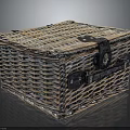 Playful Kitten Exploring Handwoven Rattan Box With Black Metal Fastener