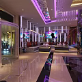 Modern KTV Lounge Interior Design With Colorful Lighting Sofas And Glass Tables