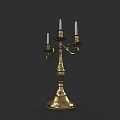 Vintage Golden Candelabra With Three Candle Holders And Carved Base Design