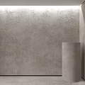 Gray Interior Wall With Rough Textured Surface And Cylindrical Decorative Column Design
