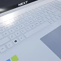 Sleek White Laptop With Ultra Thin Design And High Definition Display Screen For Portable Use