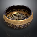 Intricate Carved Sculpture Bowl With Gold And Black Ornate Patterns And Traditional Designs