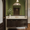 Elegant Bathroom Vanity with Green Walls Oval Mirror White Countertop and Black Cabinets