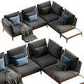Gray Sectional Sofa With Blue Pillows Throw Blanket And Wooden Legs