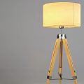 Two Beige Fabric Lampshade Wooden Tripod Floor Lamp Set On White Pedestal