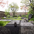 Tranquil Courtyard Garden With Stone Path Natural Rocks Trees And Lush Greenery