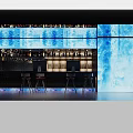 Modern Hotel Lobby With Blue LED Screens Bar Counter High Stools And Ambient Lighting