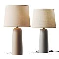 Two Modern Table Lamps with Beige and Grey Cylindrical Bases and Fabric Shades