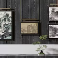 Elegant Abstract Paintings Hanging On Dark Wooden Wall With Green Plant