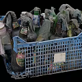 Recycled Daily Necessities In Blue Plastic Basket Filled With Old Cloths And Bottles