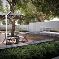 Serene Courtyard Garden Design With Wooden Deck Umbrella Tables Chairs And Green Plants