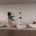 White Single Sofa With Green Plant Wall Art Ottoman And Striped Rug On Wood Floor