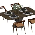 Modern Wooden Oval Dining Table Set With Four Chairs Black Cushions And Green Plant Vase