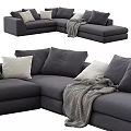 Modern Gray Sectional Sofa with White Pillows and Gray Throw Blanket 3d model