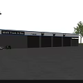 MAN Truck And Bus 4S Dealership With Garage Doors And Parked Vehicles