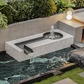 Courtyard Water Fountain with Flowing Water Lush Greenery Stone Tiles and Grass