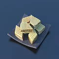 Crispy Golden Wafers Stacked On Dark Square Plate For Tasty Snacks