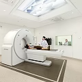 Hospital Outpatient CT Scanner Examination Room With Doctor And Patient