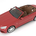 Red Luxury Convertible Car With Brown Seats And Silver Wheels