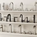 Various Modern Faucet Styles Displayed on Multiple Shelves with Different Finishes