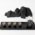 Black Tea Set with Teapot Four Cups on Black Tray Metallic Rim and Cloth Background