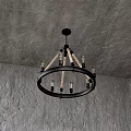 Rustic Industrial Chandelier With Rope Accents And Metal Frame Hanging From Concrete Ceiling
