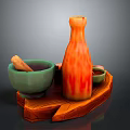 Traditional Kitchen Utensils On Wooden Tray With Mortar Pestle Orange Bottle And Small Green Bowls