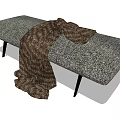 Modern Gray Sofa Bench With Textured Fabric Black Metal Legs And Brown Blanket Draped