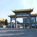 Ancient Chinese Architecture Featuring Yellow Roof Overhanging Eaves And Courtyard With Visitors