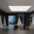 Bridal Shop Interior With Hanging Wedding Dresses Mannequin Display And City View Windows