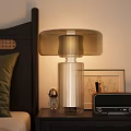 Modern Table Lamp With Striped Glass Base And Translucent Shade In Bedroom Setting