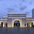 Modern Stone Entrance Gate Featuring Arched Design With Evening Lighting And People Walking