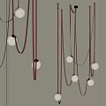 Modern Minimalist Pendant Lights With White Spherical Shades Brown Black Hanging Cords And Sleek Design