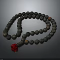 Round Black Beads Necklace With Red Flower Accent On Dark Background