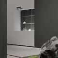 Gray Wall White Countertop Glass Display Cabinet With White Transparent Items And Stone Decoration