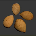 Five Fresh Orange Speckled Almonds Placed on Black Reflective Surface
