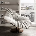Modern Elegant Accent Chair With Pleated White Design Metal Base By Window And Bookshelves
