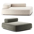 Modern Comfortable Chaise Lounge With Soft Cushions And Neutral Toned Fabric